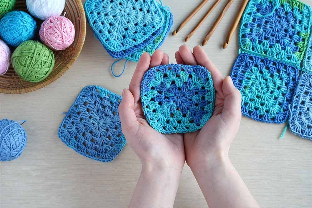 Person holding wool creation