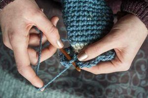 Woman crocheting